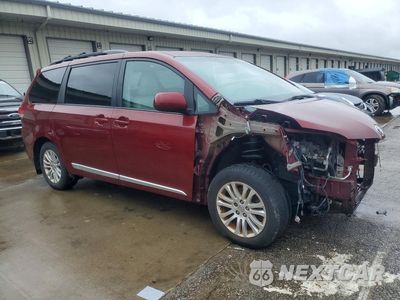 Czwarte zdjęcie samochodu z boku: 2014 TOYOTA SIENNA XLE 8-PASSENGER VIN:5TDYK3DC2ES501169 - miniatura