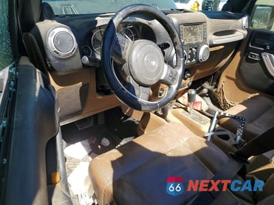 Zdjęcie 8 z 13 samochodu: 2012 JEEP WRANGLER UNLIMITED SAHARA VIN:1C4HJWEG2CL134598 - miniatura