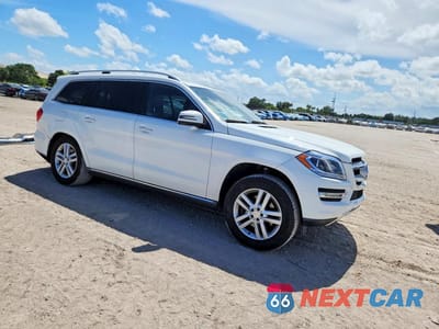 Czwarte zdjęcie samochodu z boku: 2016 MERCEDES-BENZ GL 450 4MATIC VIN:4JGDF6EE9GA698938 - miniatura