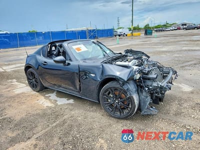 Czwarte zdjęcie samochodu z boku: 2024 MAZDA MX-5 MIATA GRAND TOURING VIN:JM1NDAM78R0607526 - miniatura