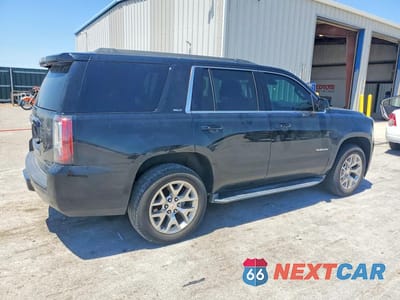 Trzecie zdjęcie samochodu z tyłu: 2015 GMC YUKON SLT VIN:1GKS2BKC3FR679860 - miniatura
