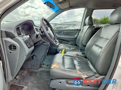Zdjęcie 7 z 13 samochodu: 2002 HONDA ODYSSEY EXL VIN:5FNRL18962B023861 - miniatura