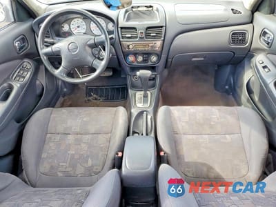 Zdjęcie 8 z 12 samochodu: 2001 NISSAN SENTRA SE VIN:3N1BB51D31L120013 - miniatura