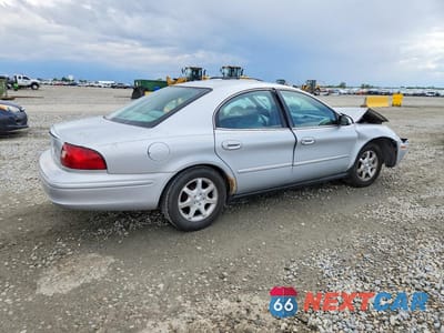 Trzecie zdjęcie samochodu z tyłu: 2002 MERCURY SABLE GS VIN:1MEFM50U62G610590 - miniatura
