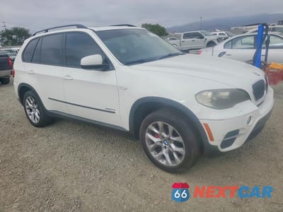Czwarte zdjęcie samochodu z boku: 2011 BMW X5 VIN:5UXZV4C54BL742330 - miniatura