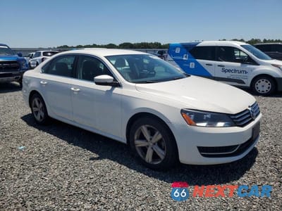 Czwarte zdjęcie samochodu z boku: 2013 VOLKSWAGEN PASSAT SE VIN:1VWBP7A33DC091319 - miniatura