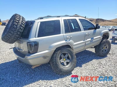 Trzecie zdjęcie samochodu z tyłu: 2000 JEEP GRAND CHEROKEE LIMITED VIN:1J4GW58N0YC359038 - miniatura