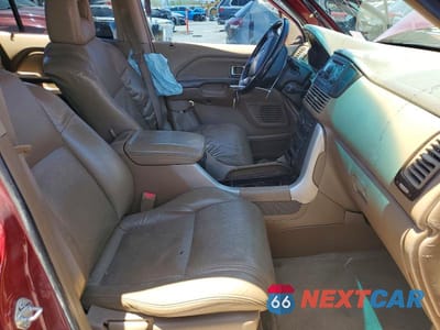Zdjęcie 7 z 14 samochodu: 2004 HONDA PILOT EXL VIN:2HKYF18624H598763 - miniatura