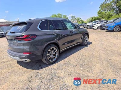 Czwarte zdjęcie samochodu z boku: 2026 BMW X5 XDRIVE40I VIN:5UX23EU08T9337019 - miniatura