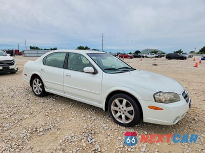 Czwarte zdjęcie samochodu z boku: 2003 NISSAN MAXIMA GXE VIN:JN1DA31A13T439768 - miniatura