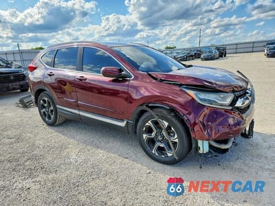 Czwarte zdjęcie samochodu z boku: 2017 HONDA CR-V TOURING VIN:2HKRW1H90HH506764 - miniatura