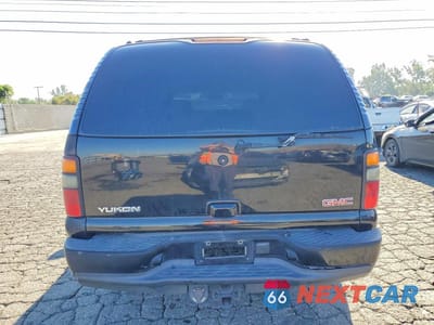 Zdjęcie 6 z 13 samochodu: 2005 GMC YUKON XL DENALI VIN:1GKFK66U55J221326 - miniatura
