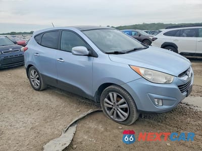 Czwarte zdjęcie samochodu z boku: 2010 HYUNDAI TUCSON VIN:KM8JU3AC8AU064473 - miniatura