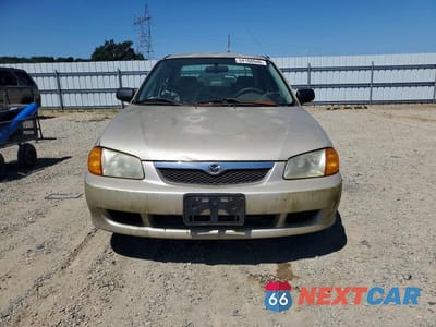 Piąte zdjęcie samochodu w środku: 1999 MAZDA PROTEGE DX VIN:JM1BJ2228X0194402 - miniatura