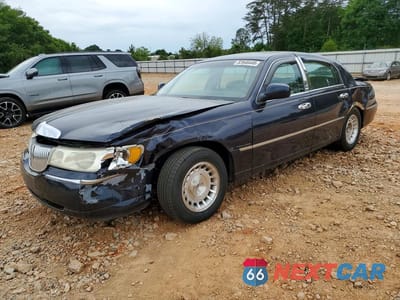 1999 LINCOLN TOWN CAR EXECUTIVE 1LNHM81W4XY665208 - główne zdjęcie licytacji z USA - miniatura