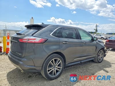 Trzecie zdjęcie samochodu z tyłu: 2019 FORD EDGE TITANIUM VIN:2FMPK4K97KBB86192 - miniatura