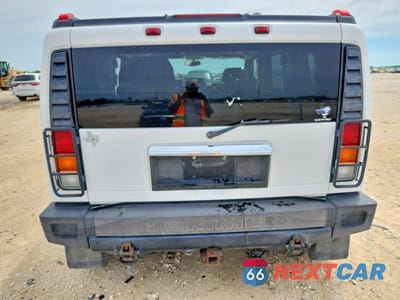 Zdjęcie 6 z 12 samochodu: 2003 HUMMER H2 VIN:5GRGN23U53H122951 - miniatura