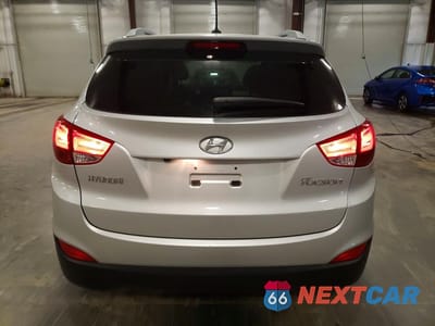 Zdjęcie 6 z 13 samochodu: 2011 HYUNDAI TUCSON GLS VIN:KM8JU3AC5BU160062 - miniatura
