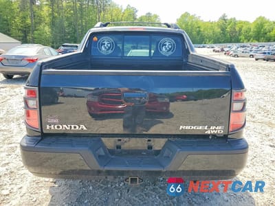 Zdjęcie 6 z 12 samochodu: 2010 HONDA RIDGELINE RTL VIN:5FPYK1F56AB001802 - miniatura