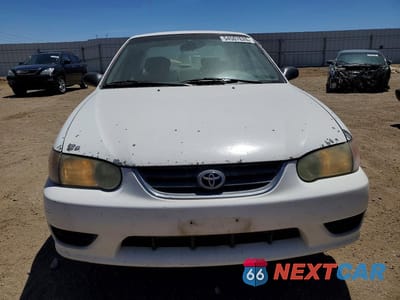 Piąte zdjęcie samochodu w środku: 2001 TOYOTA COROLLA LE VIN:1NXBR12E41Z563734 - miniatura