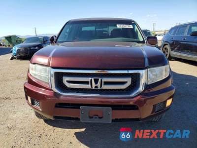 Piąte zdjęcie samochodu w środku: 2011 HONDA RIDGELINE RTS VIN:5FPYK1F41BB010965 - miniatura