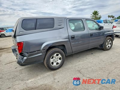 Trzecie zdjęcie samochodu z tyłu: 2010 HONDA RIDGELINE RT VIN:5FPYK1F2XAB010802 - miniatura