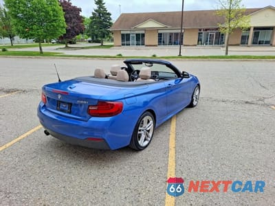 Zdjęcie 13 z 14 samochodu: 2015 BMW 228 XI VIN:WBA1K7C50FV235358 - miniatura