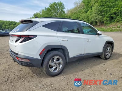 Trzecie zdjęcie samochodu z tyłu: 2022 HYUNDAI TUCSON SEL VIN:5NMJBCAE6NH017838 - miniatura