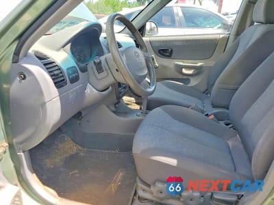 Zdjęcie 7 z 12 samochodu: 2003 HYUNDAI ACCENT GL VIN:KMHCG45C33U429984 - miniatura