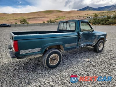 Trzecie zdjęcie samochodu z tyłu: 1991 FORD RANGER VIN:1FTCR11X7MPA10817 - miniatura