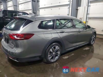 Trzecie zdjęcie samochodu z tyłu: 2018 BUICK REGAL TOURX PREFERRED VIN:W04GU8SX2J1095873 - miniatura