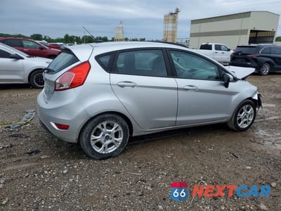 Trzecie zdjęcie samochodu z tyłu: 2014 FORD FIESTA SE VIN:3FADP4EJXEM111591 - miniatura