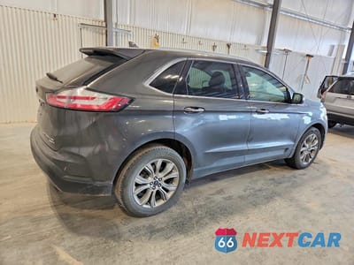 Trzecie zdjęcie samochodu z tyłu: 2019 FORD EDGE TITANIUM VIN:2FMPK4K96KBC73369 - miniatura