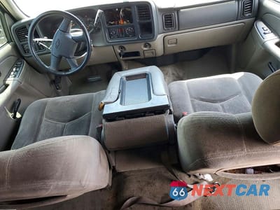 Zdjęcie 8 z 14 samochodu: 2004 CHEVROLET TAHOE C1500 VIN:1GNEC13V04R191860 - miniatura
