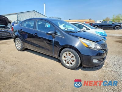 Czwarte zdjęcie samochodu z boku: 2013 KIA RIO LX VIN:KNADM4A38D6207984 - miniatura