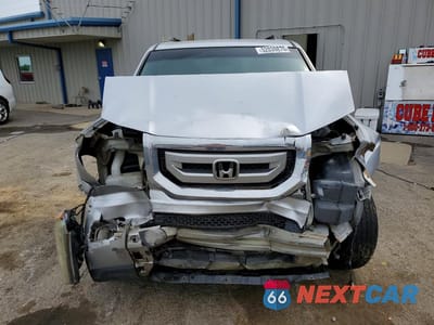 Piąte zdjęcie samochodu w środku: 2011 HONDA PILOT EX VIN:5FNYF3H4XBB030993 - miniatura
