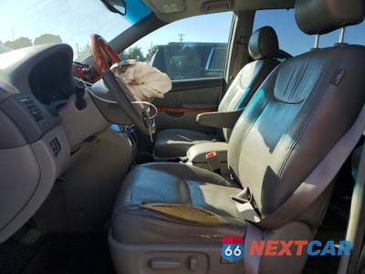 Zdjęcie 7 z 12 samochodu: 2006 TOYOTA SIENNA VAN 2WD VIN:5TDBA22C76S073557 - miniatura