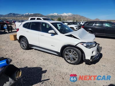 Czwarte zdjęcie samochodu z boku: 2017 BMW X1 XDRIVE28I VIN:WBXHT3C37H5F82412 - miniatura