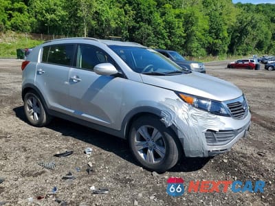 Czwarte zdjęcie samochodu z boku: 2011 KIA SPORTAGE LX VIN:KNDPB3A20B7117579 - miniatura