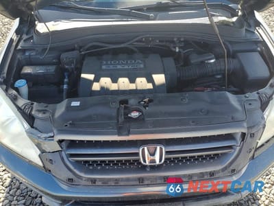 Zdjęcie 12 z 13 samochodu: 2005 HONDA PILOT EX VIN:2HKYF18455H552215 - miniatura