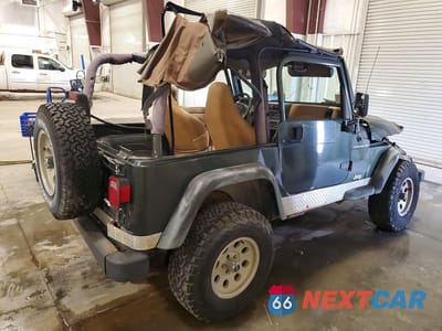 Trzecie zdjęcie samochodu z tyłu: 1998 JEEP WRANGLER / TJ SE VIN:1J4FY29P6WP770356 - miniatura