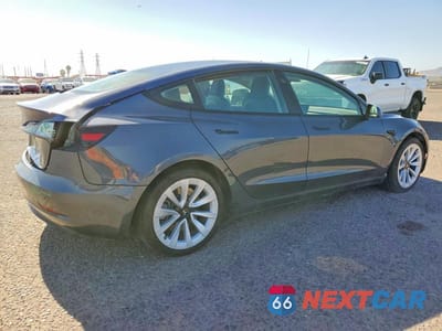 Trzecie zdjęcie samochodu z tyłu: 2022 TESLA MODEL 3 VIN:5YJ3E1EA8NF303896 - miniatura