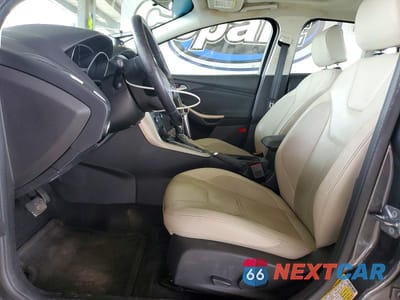 Zdjęcie 7 z 12 samochodu: 2017 FORD FOCUS TITANIUM VIN:1FADP3J20HL288147 - miniatura