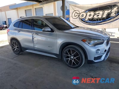 Czwarte zdjęcie samochodu z boku: 2016 BMW X1 XDRIVE28I VIN:WBXHT3C30G5E56309 - miniatura