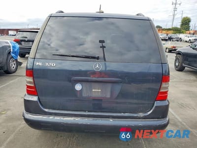 Zdjęcie 6 z 12 samochodu: 2001 MERCEDES-BENZ ML 320 VIN:4JGAB54E21A253913 - miniatura