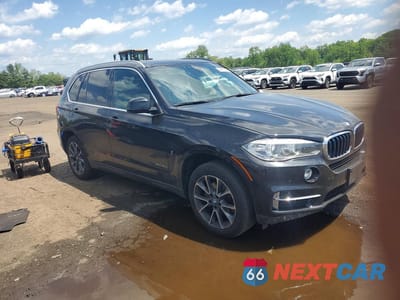 Czwarte zdjęcie samochodu z boku: 2018 BMW X5 XDR40E VIN:5UXKT0C5XJ0V98458 - miniatura