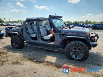 Czwarte zdjęcie samochodu z boku: 2022 JEEP GLADIATOR MOJAVE VIN:1C6JJTEG7NL167784 - miniatura