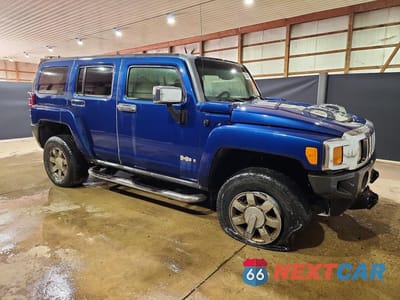 Czwarte zdjęcie samochodu z boku: 2006 HUMMER H3 VIN:5GTDN136668149492 - miniatura