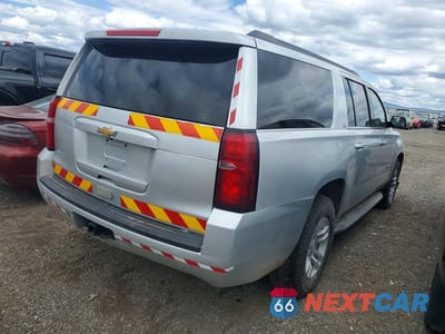 Trzecie zdjęcie samochodu z tyłu: 2018 CHEVROLET SUBURBAN K1500 LT VIN:1GNSKHKC8JR386647 - miniatura