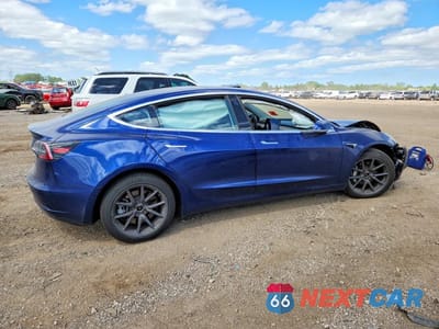 Trzecie zdjęcie samochodu z tyłu: 2018 TESLA MODEL 3 VIN:5YJ3E1EB9JF095191 - miniatura